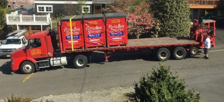 A truck navigating the peak moving season with portable storage