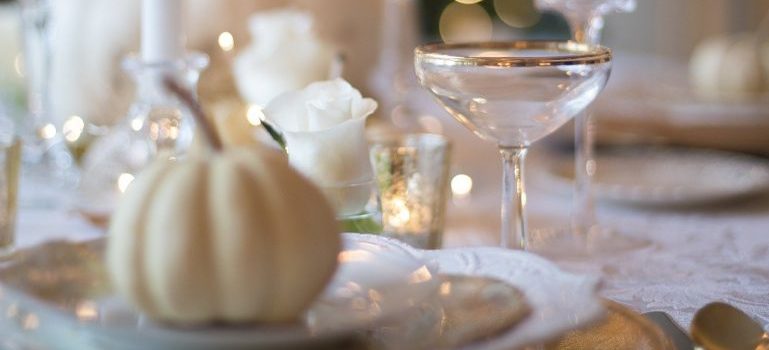 Holiday table set up with glasses and plates