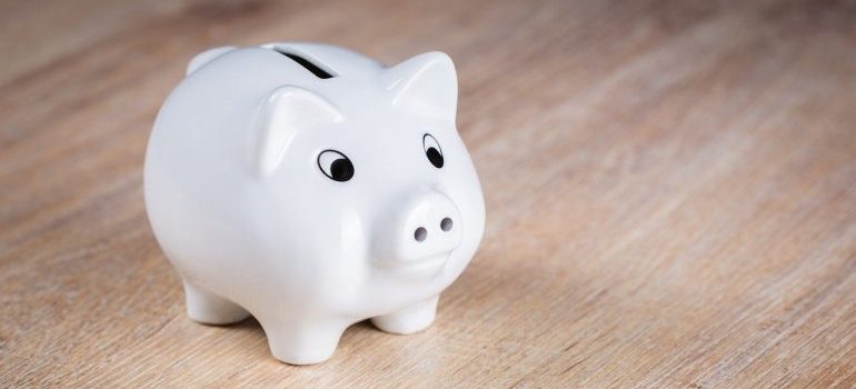 A white piggy bank. 