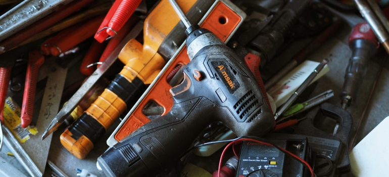 black and orange cordless power drill