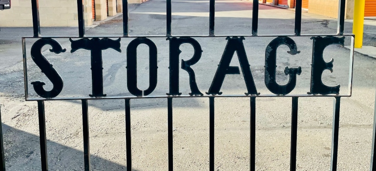 Storage facility gates symbolizing things to know before renting self-storage