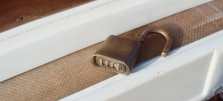a brown metal padlock