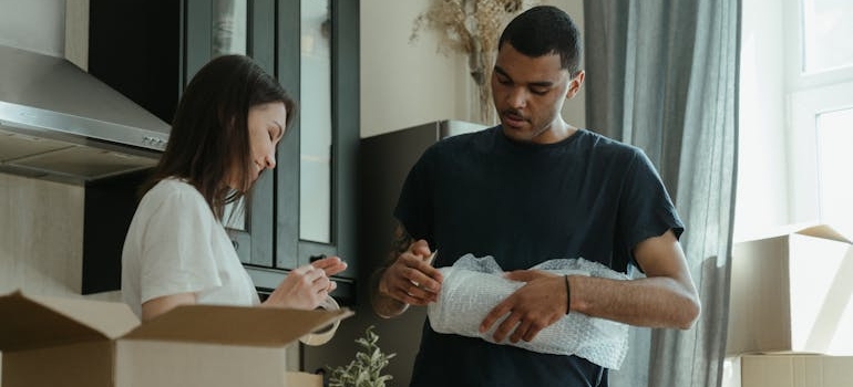 A couple is showing how to save time while packing