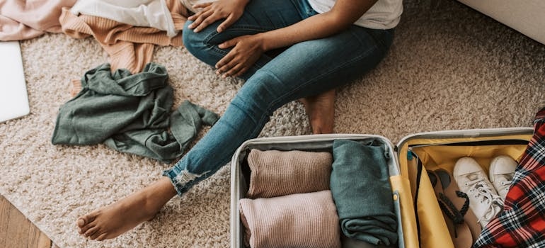 A Woman Packing Her Suitcase