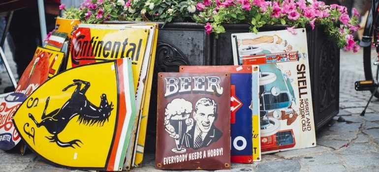 Vinyls and books displayed in a yard.