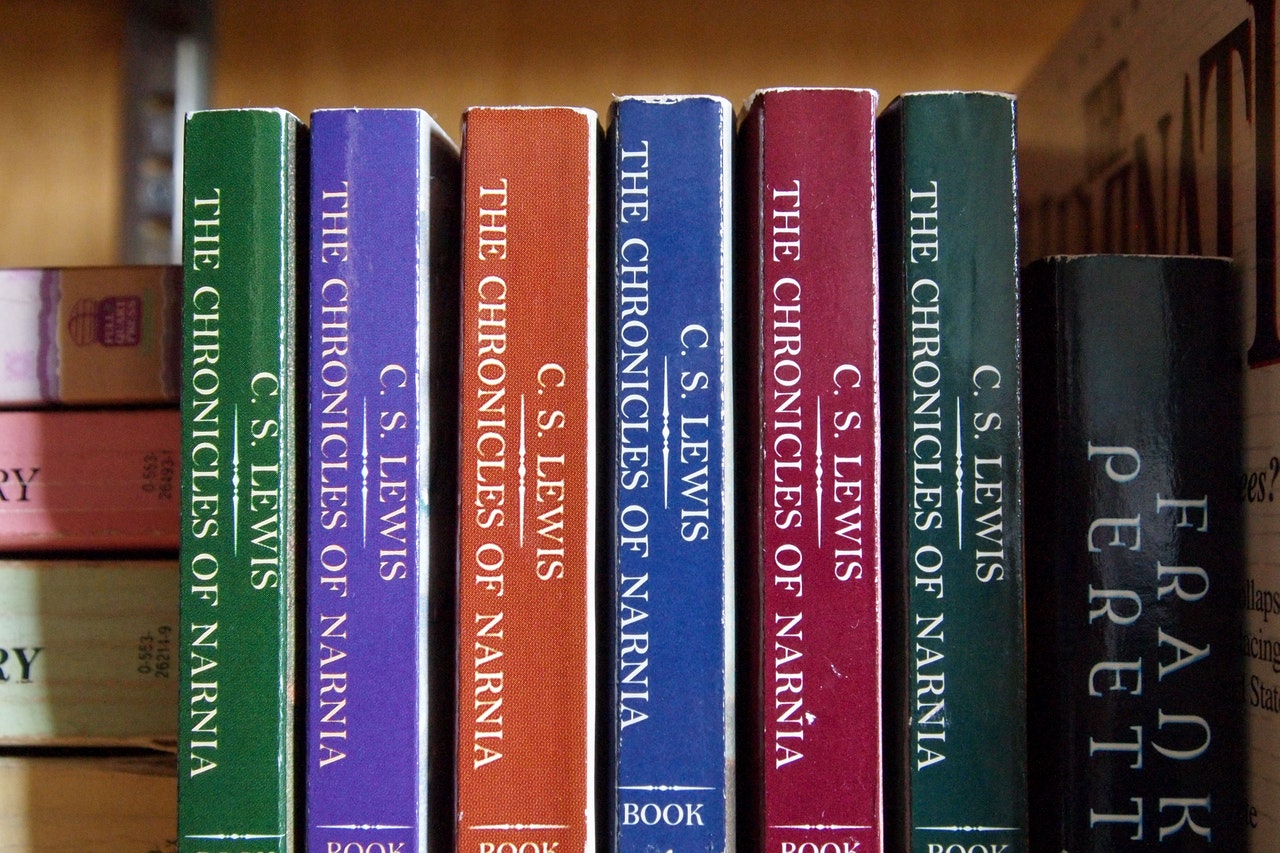 Stacked books on a shelf