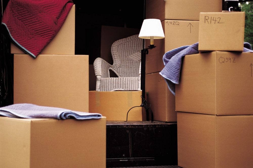 Boxes and furniture on a moving day.