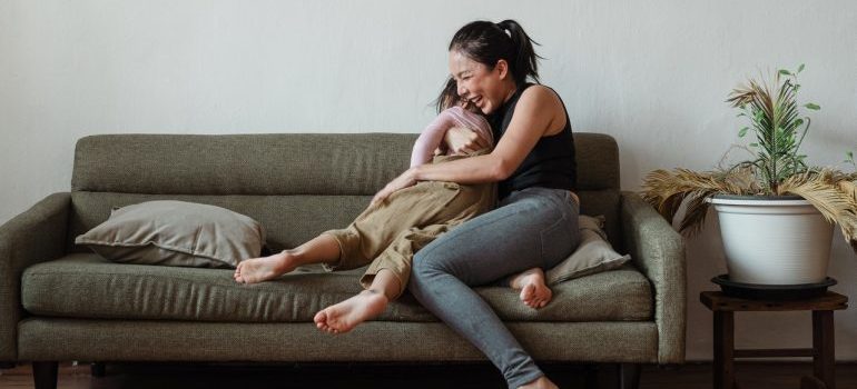 Woman hugging a child
