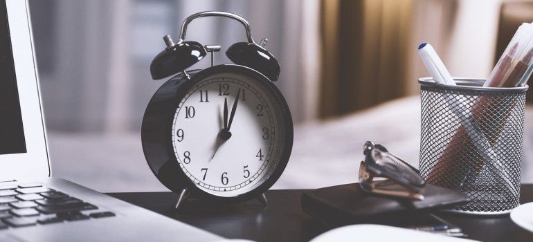 A black alarm clock.