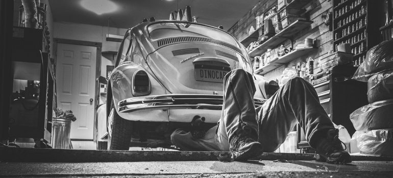 A man working on a car.