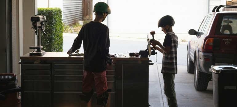 Two boys show how to make more space in your garage