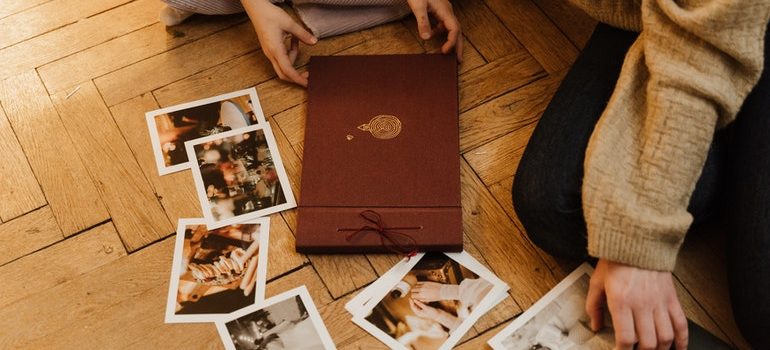 Person looking at old photos.