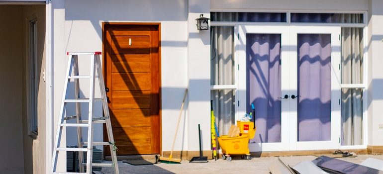 Person maximizing space while working from home by adding a room to their home.