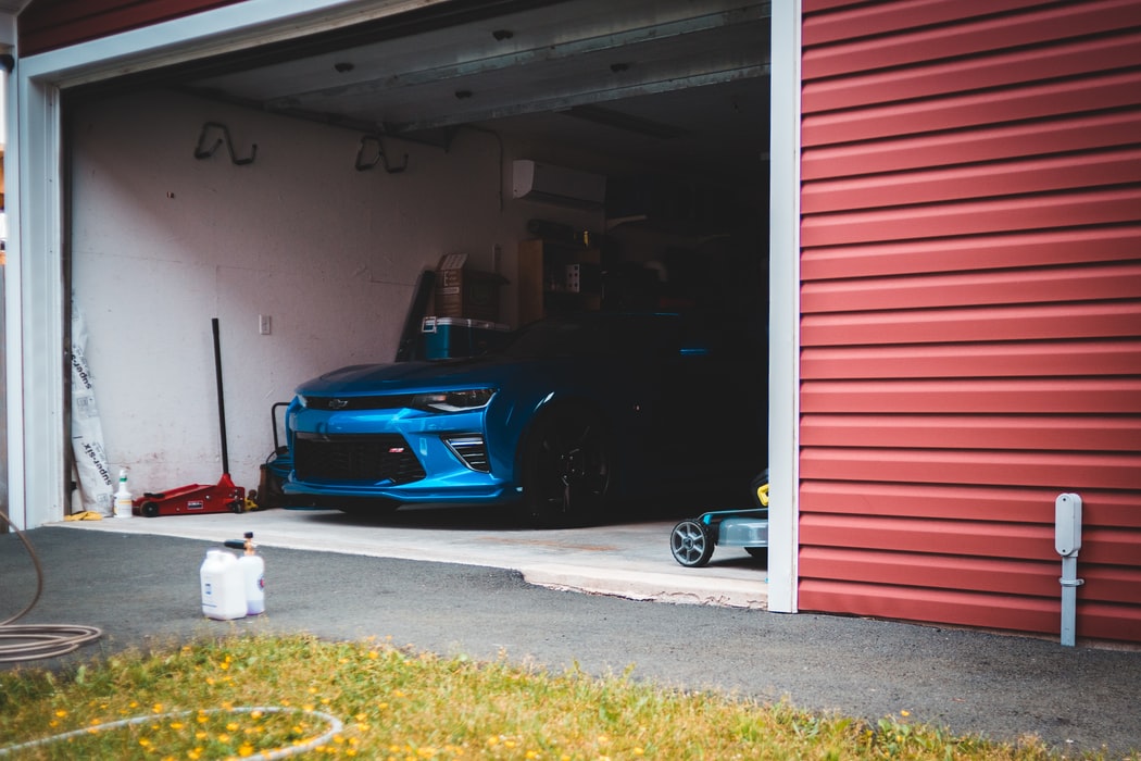 Car parked in a garage.