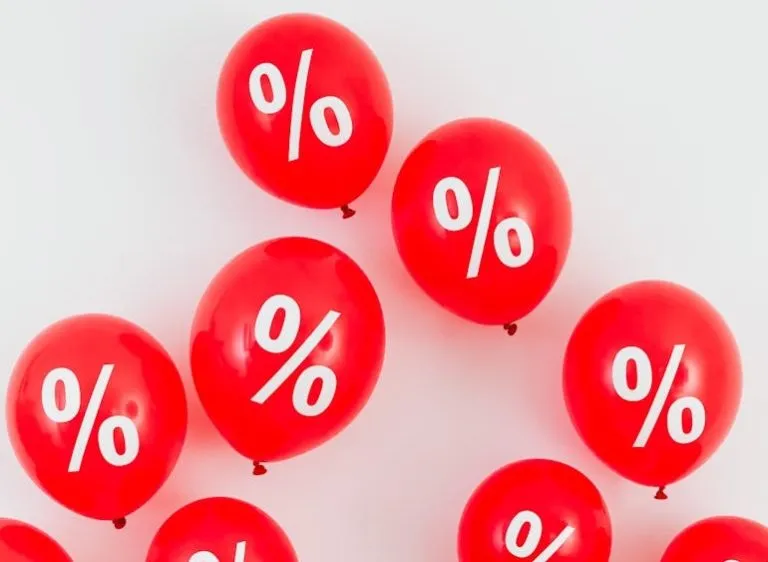 Red balloons with percentage symbols