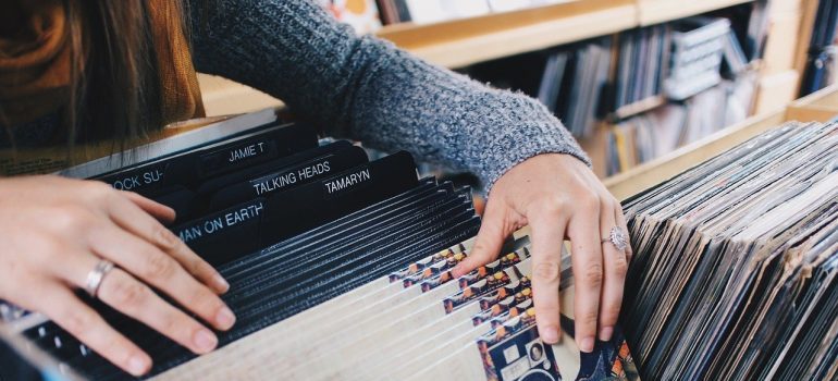 A woman going through vinyl records.