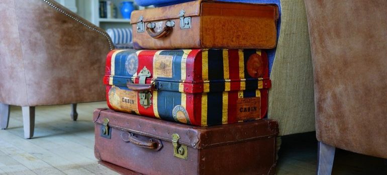 Three suitcases to use as improvised at-home packing supplies. 