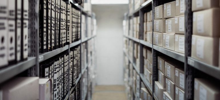 A row of shelves filled with documents.