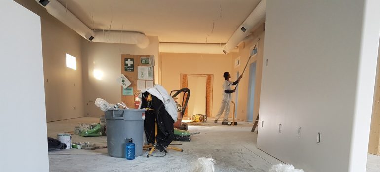 A person remodeling a house