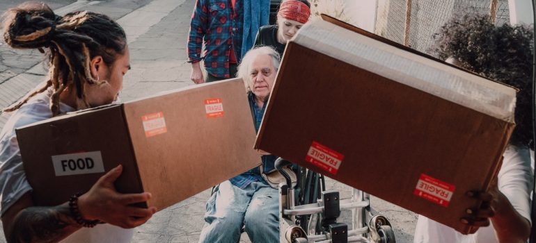 People donating extra belongings from storage