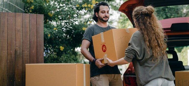 Couple with moving boxes