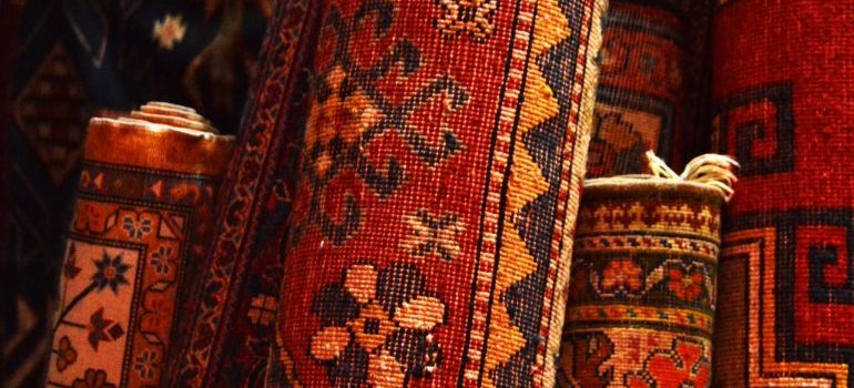 some of the items you should move from your attic to self storage - rugs