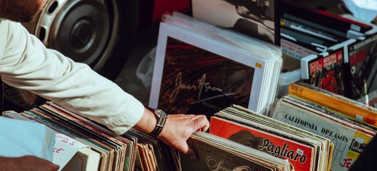 A person browsing through items on sale 