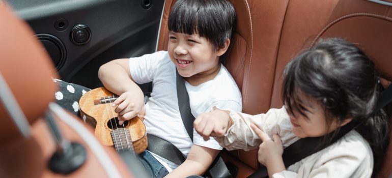 Kids sitting in a car