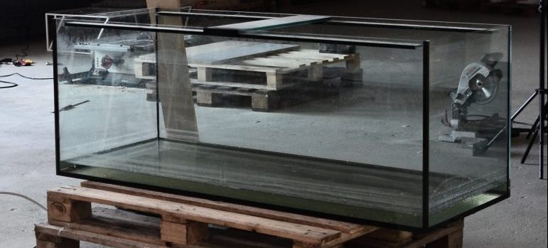 empty aquarium on wooden palettes