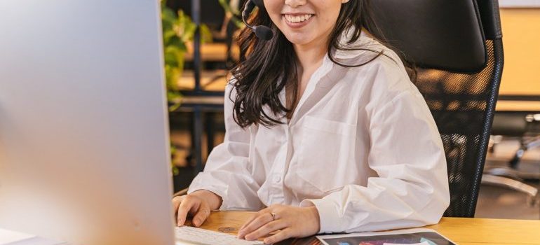 A person infront of a computer 