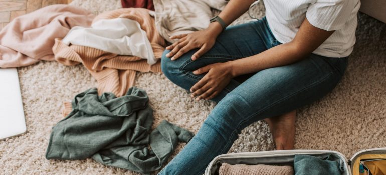 person packing clothes