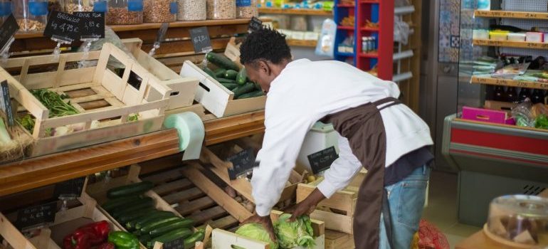 An employee in a grocery store 
