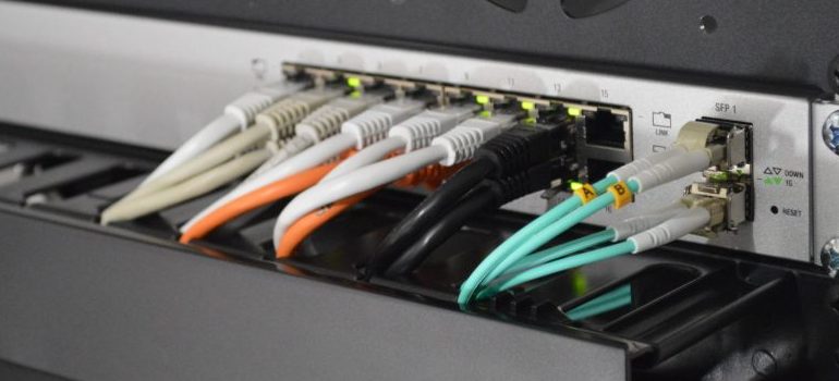 a router with several cables plugged in