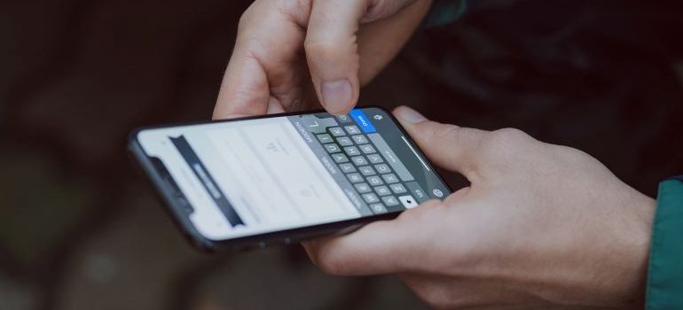 man browsing through inventory apps