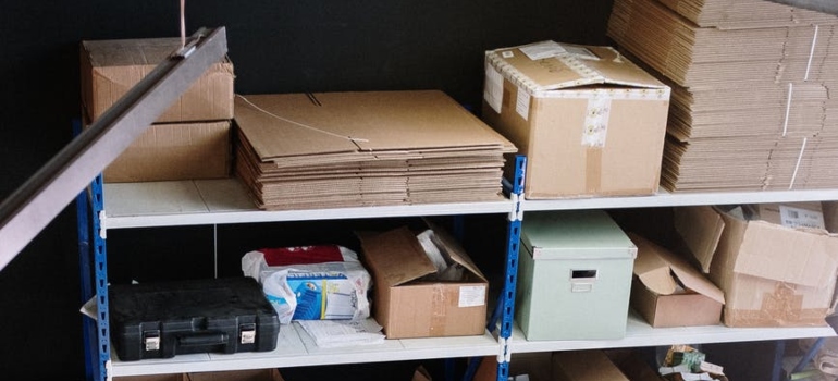 Shelf with cardboard packing materials.