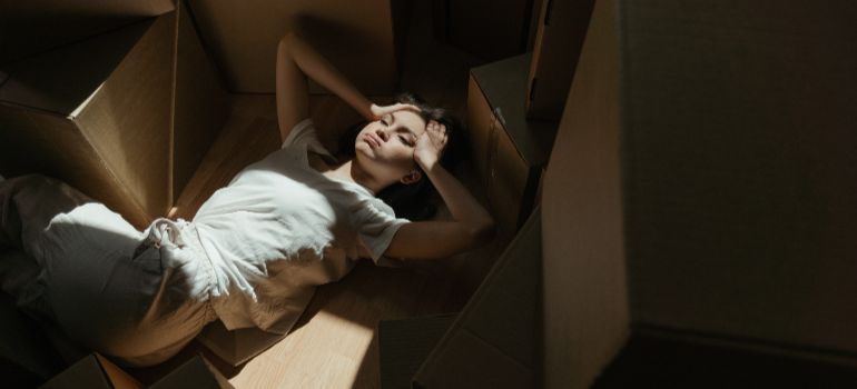 Woman trying to decide between storage container vs attic