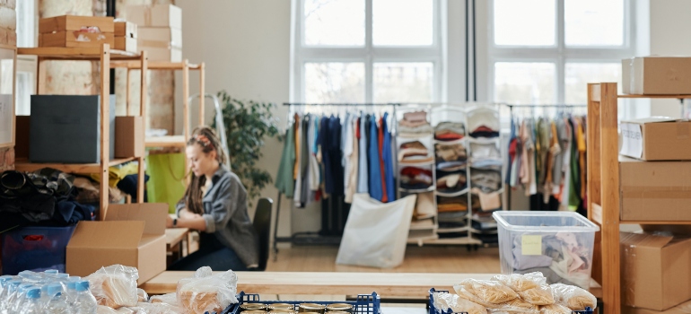 a woman sorting out items