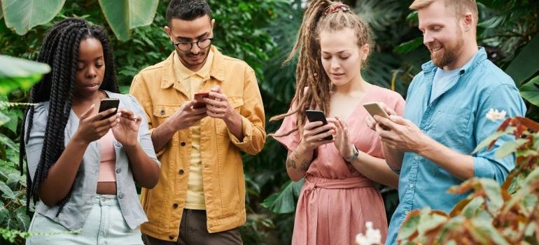 Young people looking at their phones