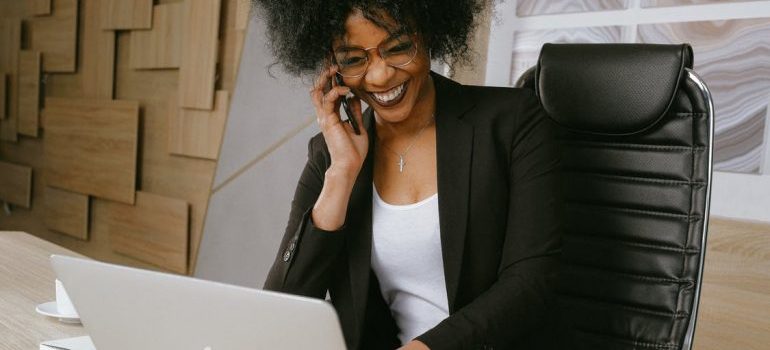 A woman calling an agency for storing electronic devices