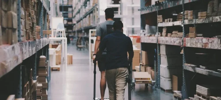 People walking around the storage facility
