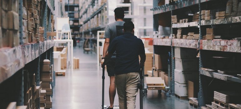 storage unit and two men