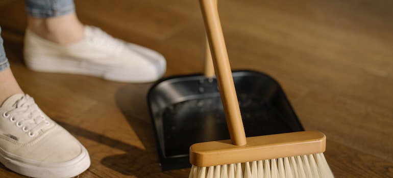 a person with a cleaning brush