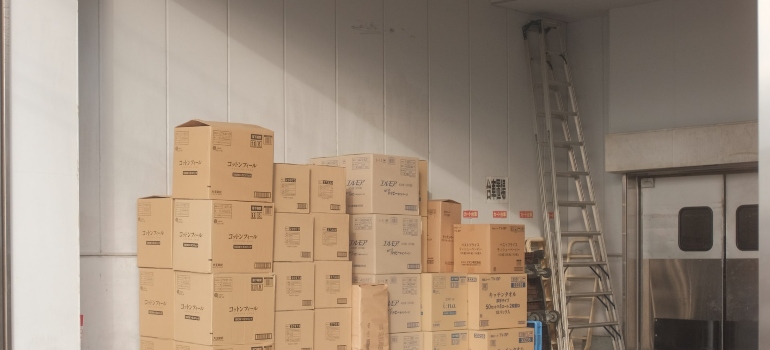 cardboard boxes outside a storage unit