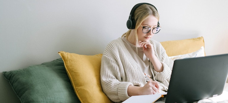 a girl with her computer looking for eco-friendly storage in seattle