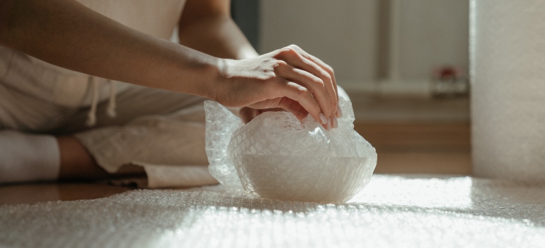 person packing the bowl