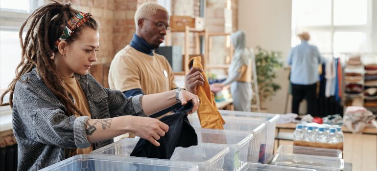 non-profits volunteers preparing items for mobile storage