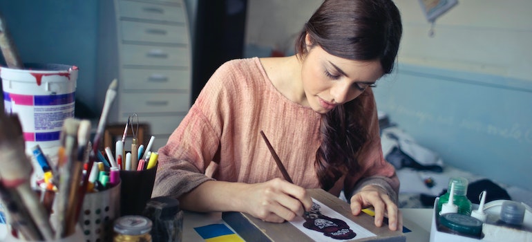 a woman painting