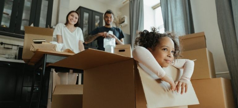 family packing using portable storage when moving with kids