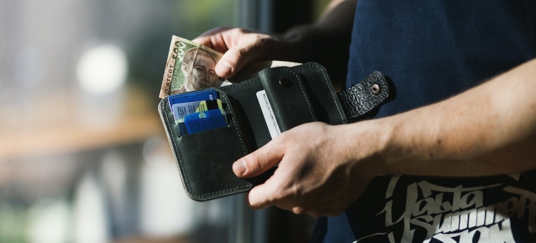 a person saving money when busting one of the Myths about Storage Container Rental