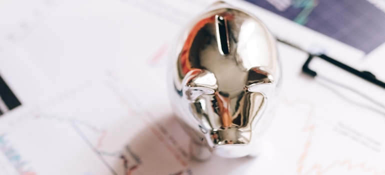 A piggy bank on budget papersr